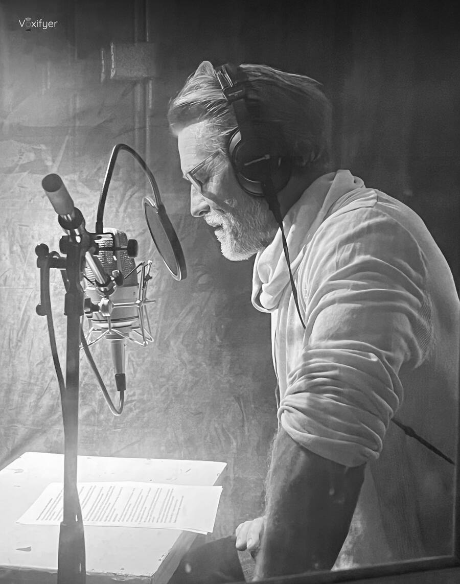 A talent recording from a script in the studio
